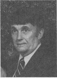 Portrait photo of John E. Davis II.